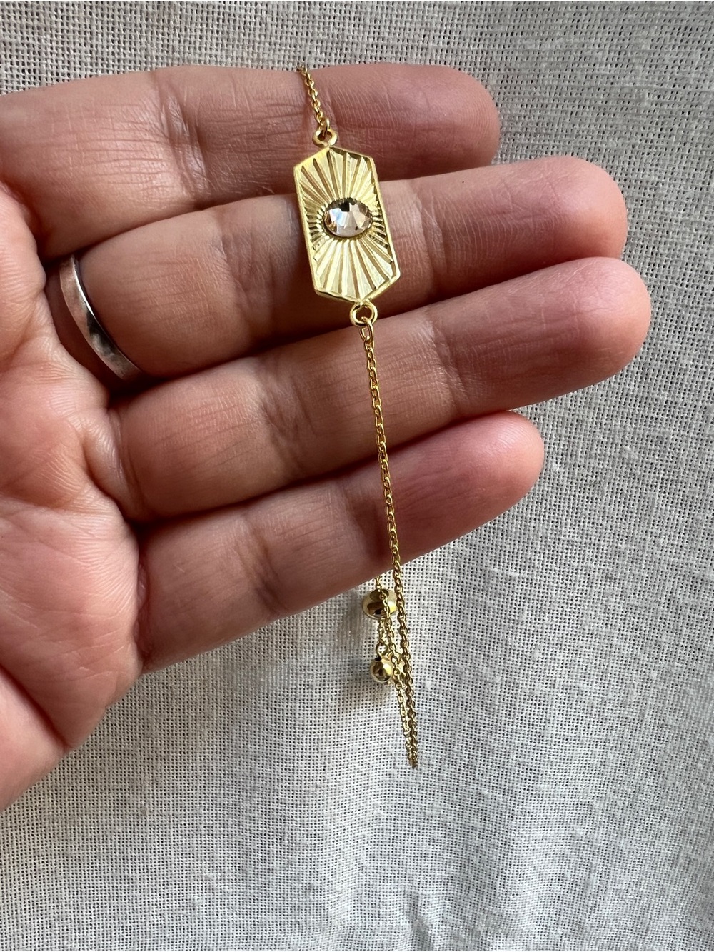 Gold plated Sterling Silver Sunburst Pendant Bracelet with Crystal Accent